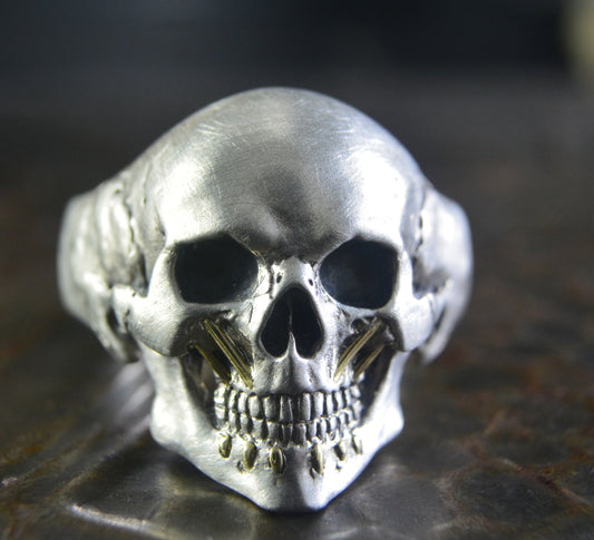 Personalized skull rings, Reserved to J.