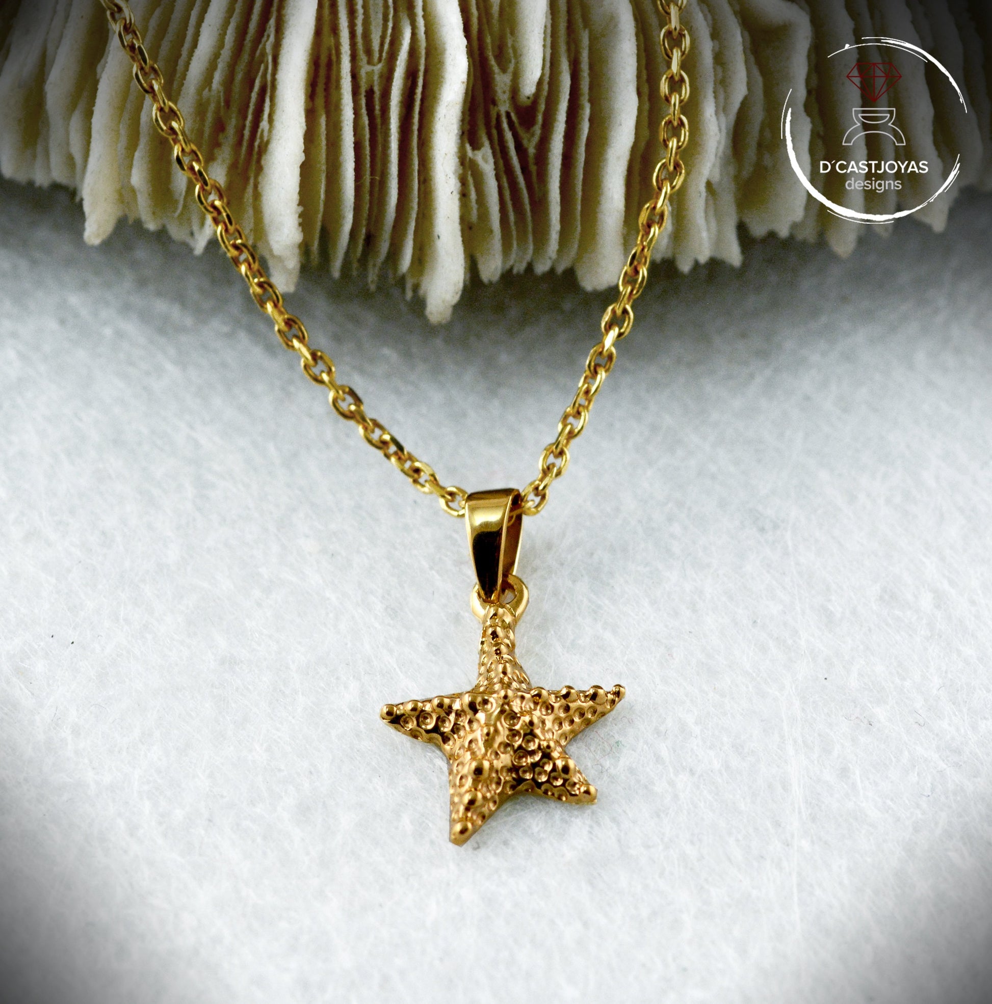Colgante estrella de mar pequeña hecho a mano en plata, Estrella dorada - D´Cast