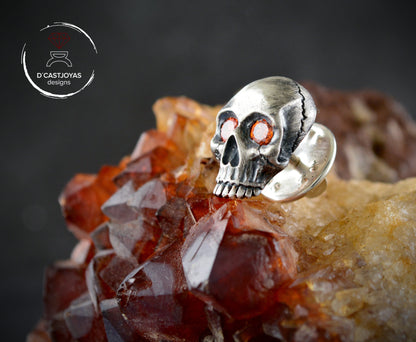 Sterling silver skull pin with natural stones in the eyes