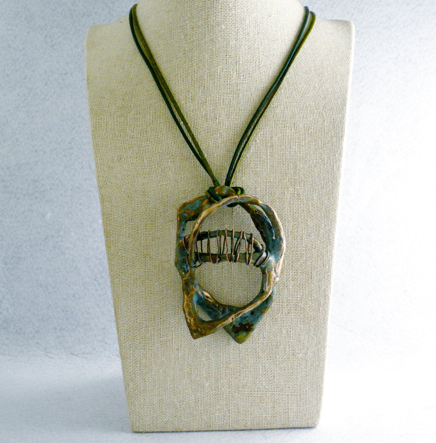 Artistic Galaxy pendant handmade in bronze with hammered textures, Contemporary Jewelry