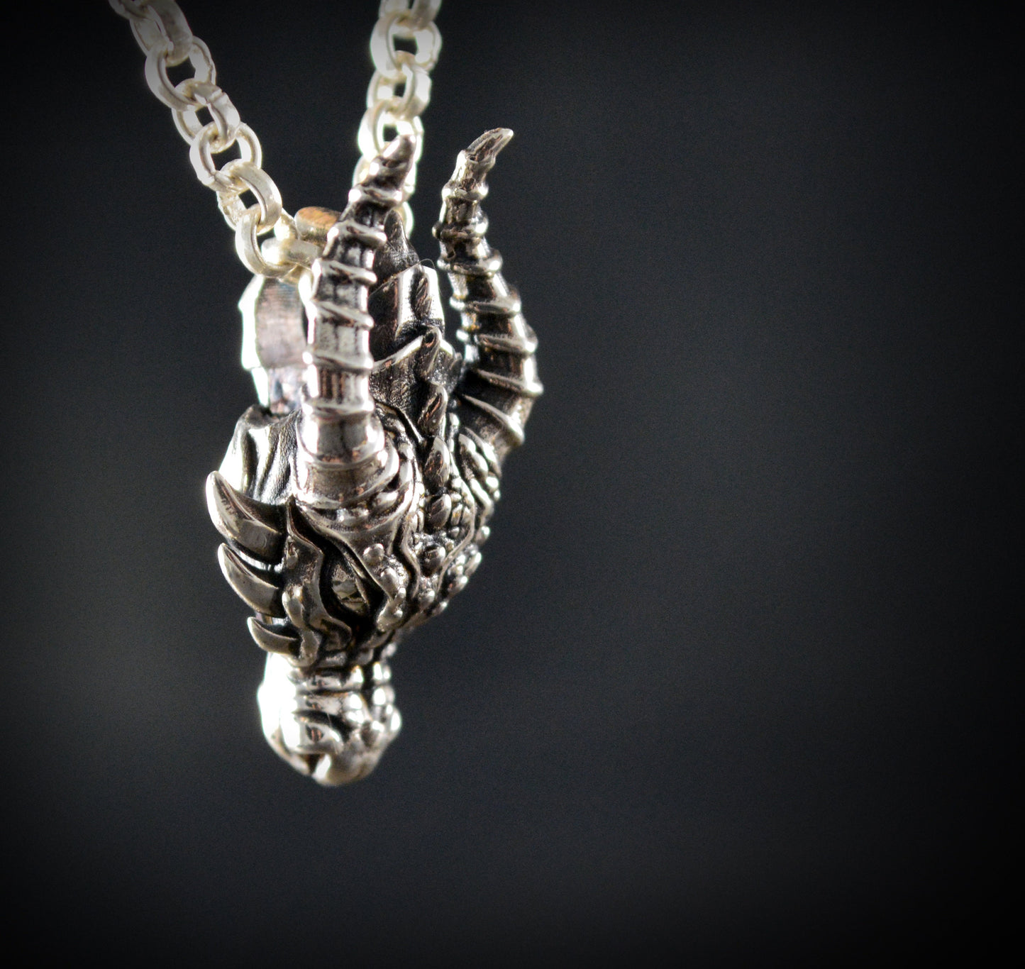 Handmade dragon head pendant in solid sterling silver