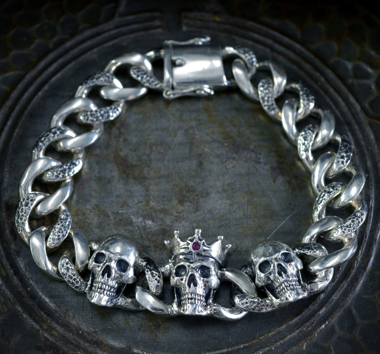 Solid silver bracelet with three skulls, Cuban chain links and locking box clasp, Memento mori