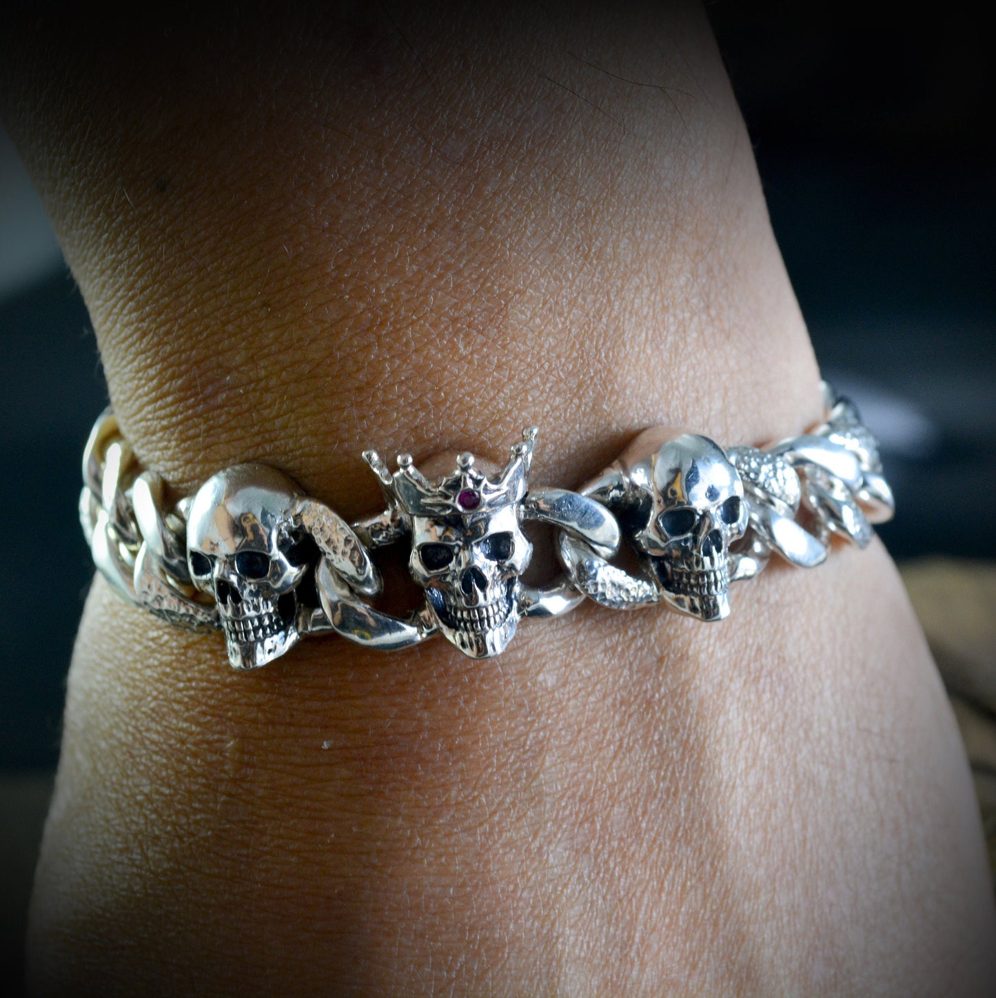 Solid silver bracelet with three skulls, Cuban chain links and locking box clasp, Memento mori