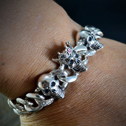 Solid silver bracelet with three skulls, Cuban chain links and locking box clasp, Memento mori